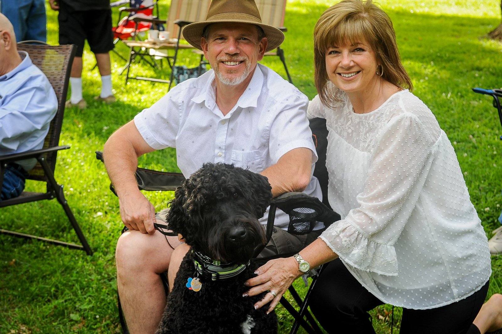 Two people smiling at a BCSWE outdoor gathering