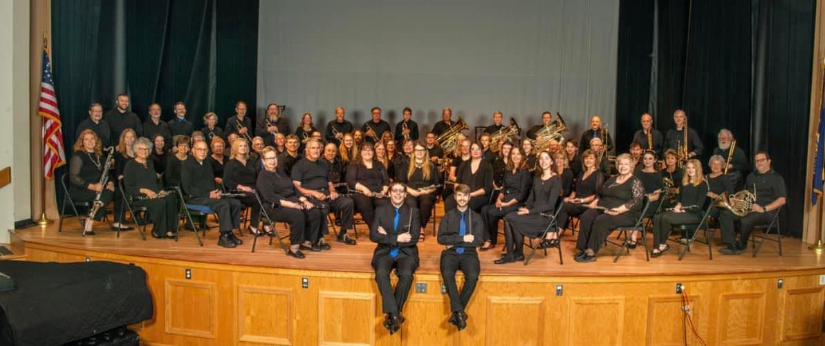 BCSWE musicians gathered with their instruments on stage